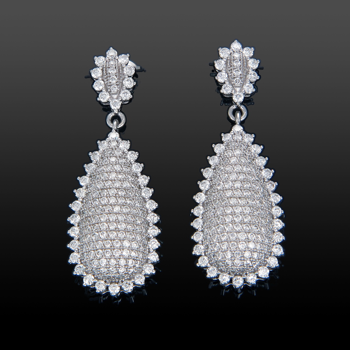 Elegant gold earrings by Diya Jewel