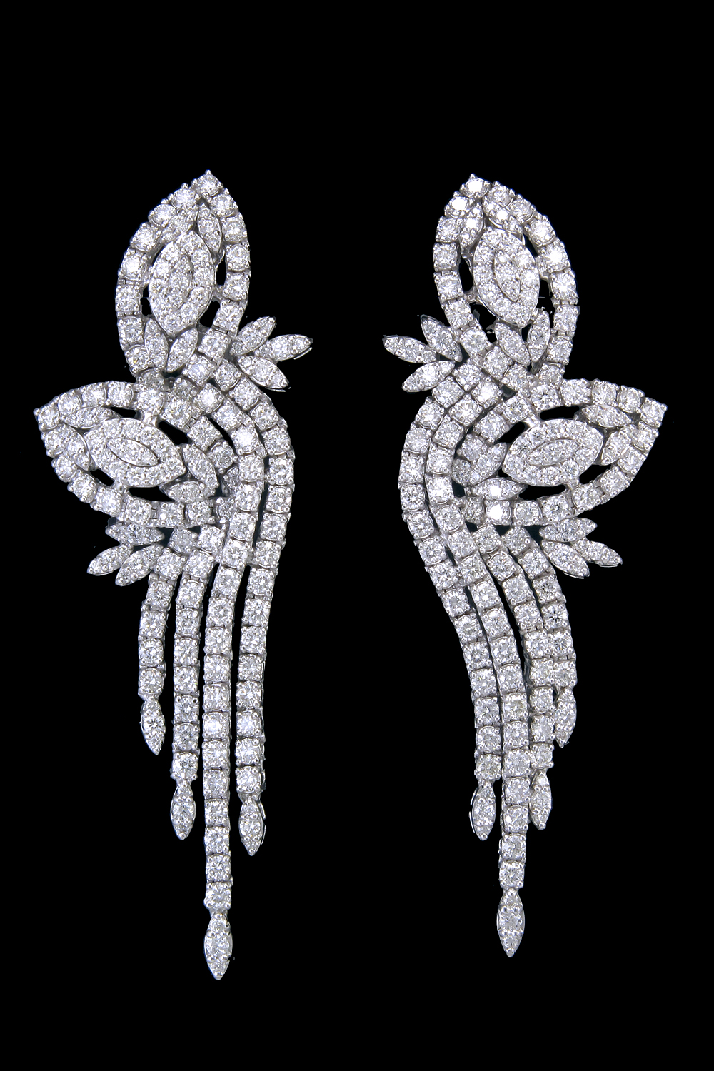 Modern gold earrings by Diya Jewel